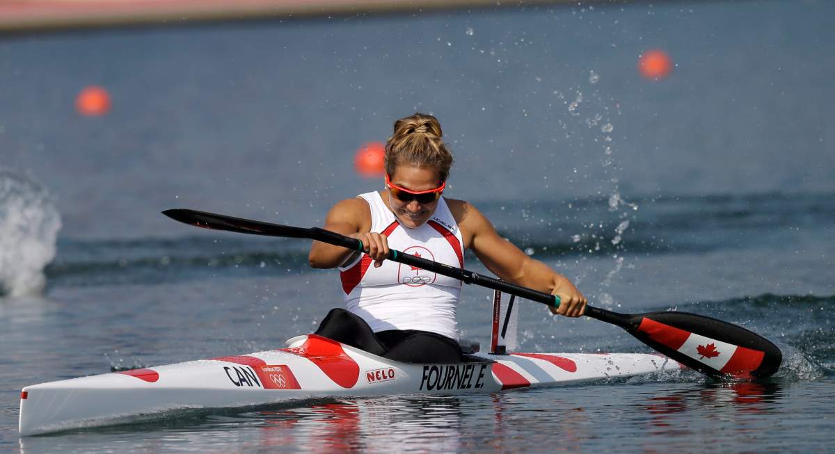 Canada’s Émilie Fournel paddles in a women’s kayak single 200m semifinal in Eton Dorney, near Windsor, England, at the 2012 Summer Olympics, Friday, Aug. 10, 2012. (AP Photo/Armando Franca)