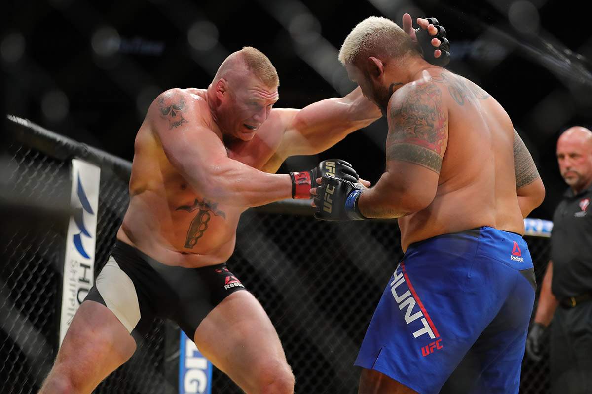  Brock Lesnar looks to take down Mark Hunt during the UFC 200 event at T-Mobile Arena on July 9, 2016 in Las Vegas, Nevada.