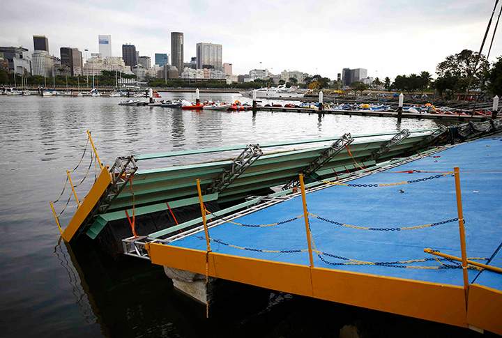 A ramp built for competitors’ boats to reach the water hangs after collapsing at the Marina da Gloria sailing venue just days before the start of the Rio 2016 Olympic Games in Rio de Janeiro, July 31, Brazil 2016.