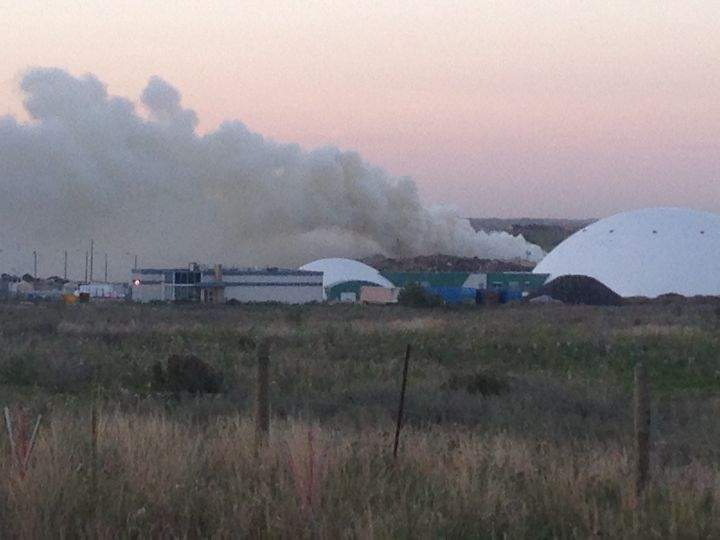 Crews with Edmonton Fire Rescue Services battle a fire at a city waste facility Tuesday evening. Aug. 30, 2016.