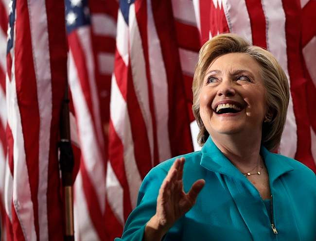Democratic presidential candidate Hillary Clinton looks up to audience members as she leaves a campaign event at Truckee Meadows Community College in Reno, Nev., Thursday, Aug. 25, 2016. 