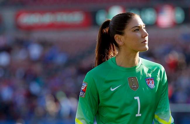  In this Feb. 13, 2016, file photo, United States goalie Hope Solo walks off the field at half time of a CONCACAF Olympic qualifying tournament soccer match. 