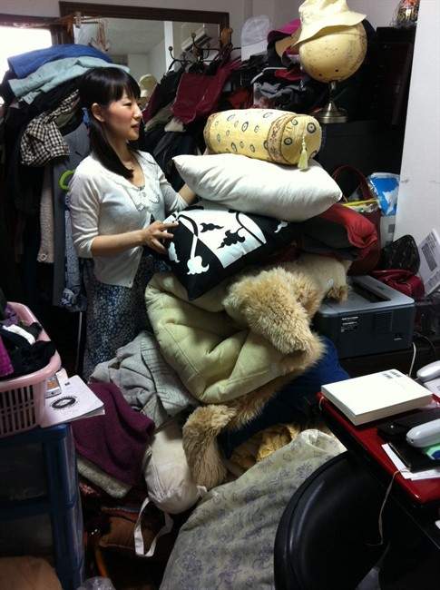 Marie Kondo working at a client's home to clear away everything that is unneeded in Tokyo, Japan. Kondo is the author of the book, "The Life-Changing Magic of Tidying Up.".