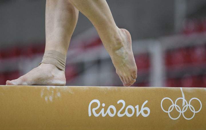 An athlete on the balance beam during a training session for the Rio 2016 Olympic Games events at the Rio Olympic Arena.