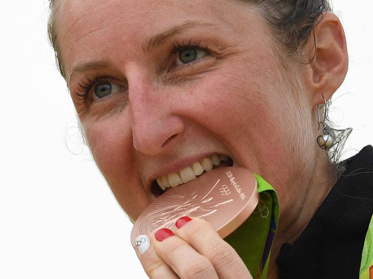 Canada's Catharine Pendrel celebrates bronze in the women's cross-country mountain bike at the 2016 Olympic Summer Games in Rio de Janeiro, Brazil on Saturday, Aug. 20, 2016. 