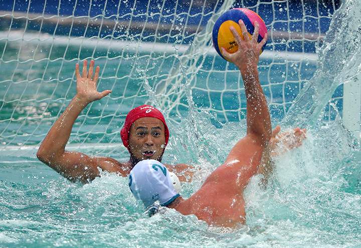 Richie Campbell of Australia attempts to score a goal against Japan during preliminary Group A water polo action at the Maria Lenk Aquatics Centre in Rio de Janeiro, Brazil on August 10, 2016. 