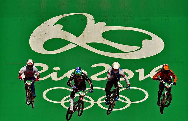 Athletes train before the BMX cycling seeding run at the X-Park BMX venue in Deodoro during the Rio 2016 Olympic Games in Rio de Janeiro on August 17, 2016.