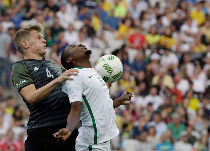 Germany’s Mathias Ginter, left, and Nigeria’s Oluwafemi Ajayi go for a header during a semi-final match of the men’s Olympic soccer tournament between Germany and Nigeria in Sao Paulo, Wednesday Aug. 17, 2016.