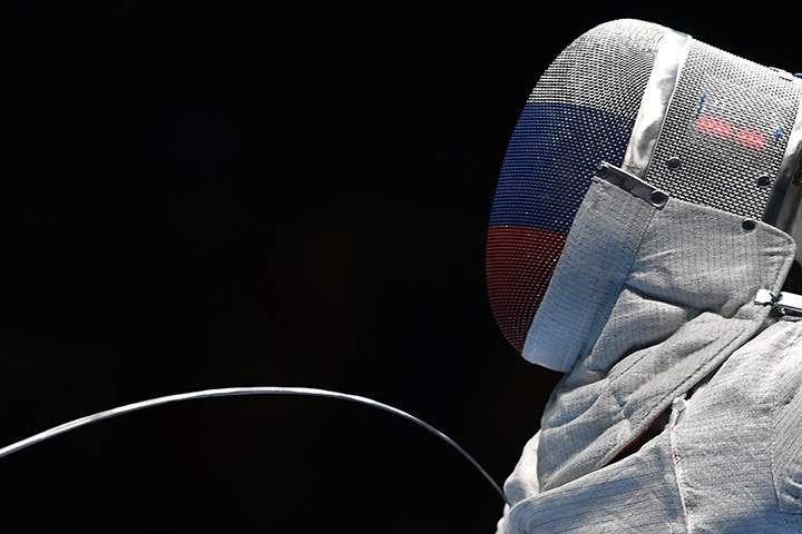 Russia’s Nikolay Kovalev competes against Italy’s Aldo Montano during their men’s individual sabre fencing event of the Rio 2016 Olympic Games on August 10, 2016.