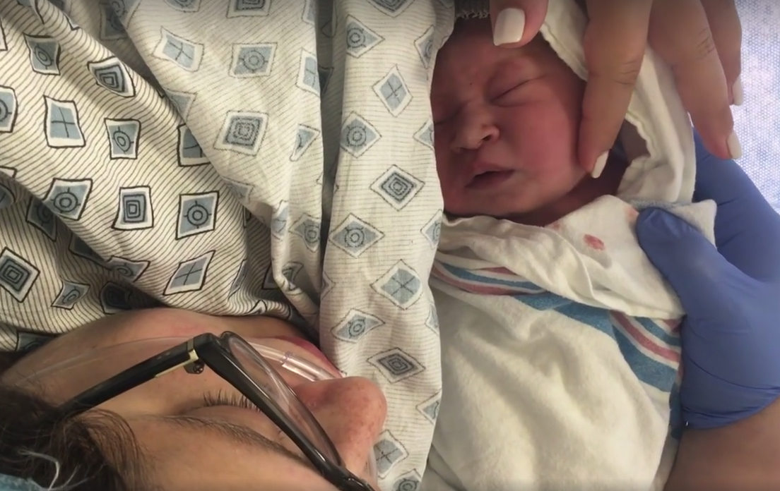 Anna Theodorou cradles her daughter Lea in hospital. Her husband, Philip Balabanos, snapchatted her entire labour.