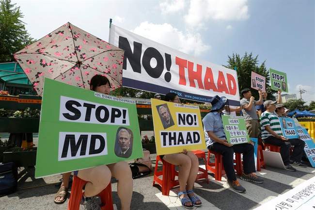 South Korean protesters stage a rally opposing a plan to deploy an advanced U.S. missile defense system in the country called Terminal High-Altitude Area Defense, or THAAD, in front of the Defense Ministry in Seoul, South Korea, Thursday, Aug. 11, 2016. James Syring, director of the U.S. Missile Defense Agency, arrived on Thursday to meet with South Korean officials on the deployment of THAAD. The need for and safety of THAAD are still being debated in South Korea after the government decided in early July to install it as a defensive measure against threats from North Korea.