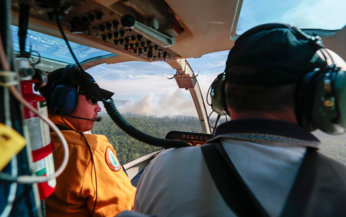Crews fighting the Seven Mile Lake fire from the sky. The fire grew about 100 hectares overnight Monday.