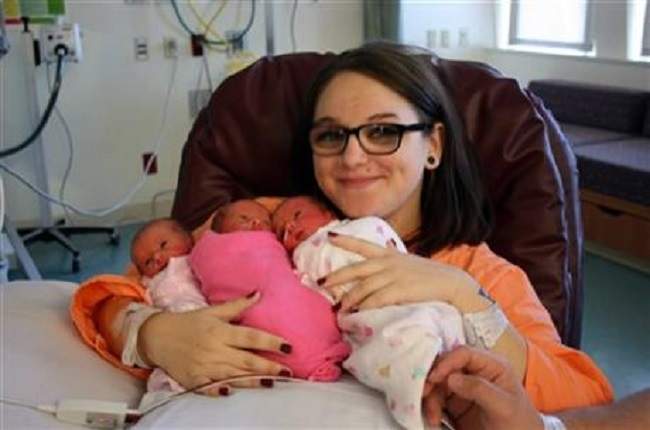 Amber Hills gave birth to identical triplet girls in Portland, Ore., on Monday, Aug. 1, 2016.