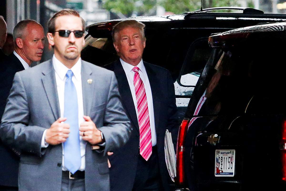 Republican presidential nominee Donald Trump (R) exits the building after a meeting with his Hispanic Advisory Council at Trump Tower in the Manhattan borough of New York, U.S., August 20, 2016. 