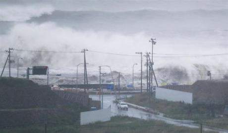 Waves crash against a coast in Ishinomaki, Miyagi prefecture, northeastern Japan, Tuesday, Aug. 30, 2016. A typhoon is about to barrel into northern Japan, threatening to bring floods to an area still recovering from the 2011 tsunami. Typhoon Lionrock has already paralyzed traffic, caused blackouts and prompted officials to urge residents to evacuate.