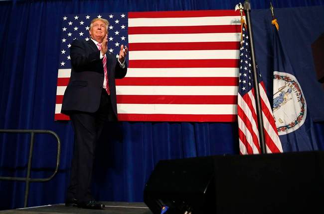 Republican presidential candidate Donald Trump arrives to speak at a campaign rally in Fredericksburg, Va., Saturday, Aug. 20, 2016.
