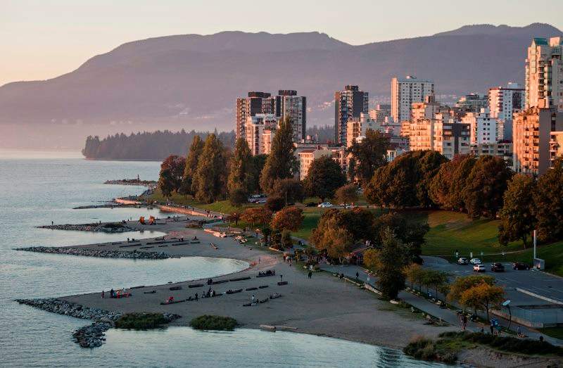 A scenic view at twilight of Sunset Beach on the West End's waterfront, English Bay, Vancouver, B.C.