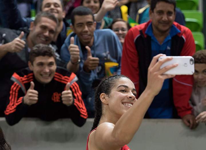 Canada’s Kia Nurse takes a selfie for fans after defeating Senegal in basketball preliminary round action at the 2016 Summer Olympics in Rio de Janeiro, Brazil, Wednesday, Aug. 10, 2016.