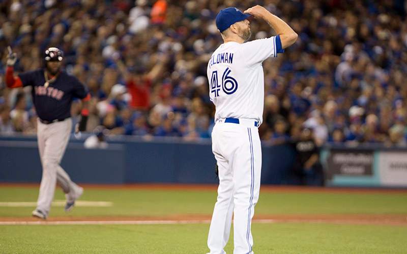 Toronto Blue Jays relief pitcher Scott Feldman reacts to a three-run homerun off the bat of Boston Red Sox first baseman Hanley Ramirez during seventh inning American League MLB baseball action in Toronto on Friday, September 9, 2016. 