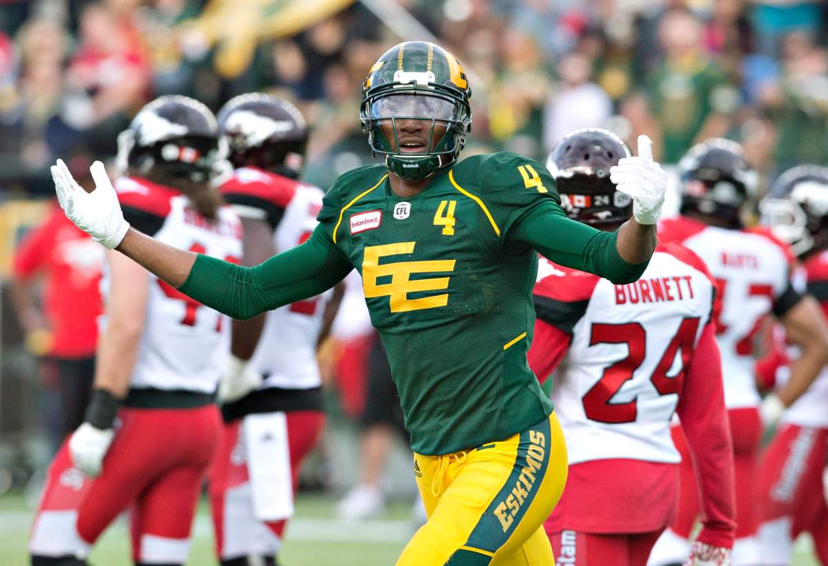 Edmonton Eskimos' Adarius Bowman (4) celebrates a touchdown against the Calgary Stampeders during first half CFL action in Edmonton, Alta., on Saturday, Sept. 10, 2016.