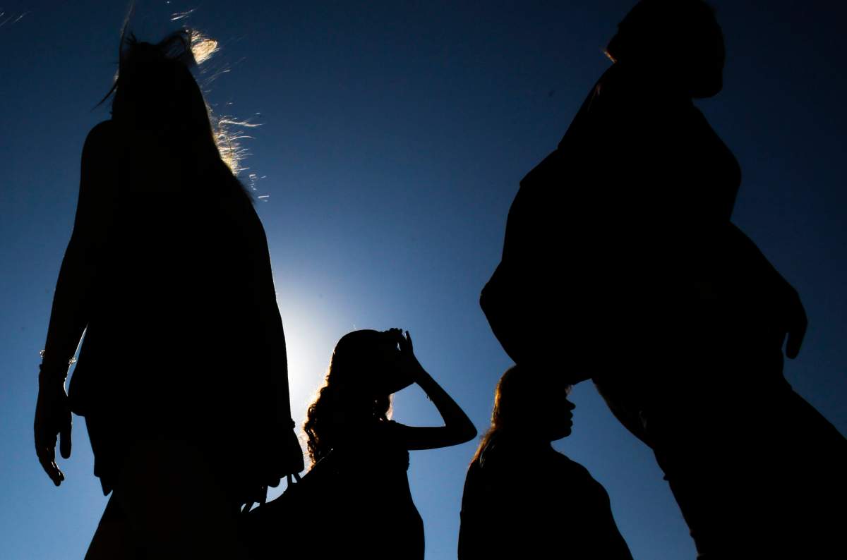Silhouette of women.