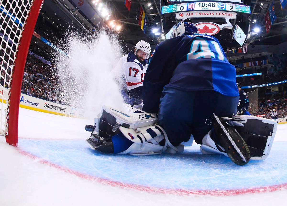 Team Europe goalie Jaroslav Halak (41) makes a save against Team USA centre Ryan Kesler (17) during second period World Cup of Hockey action in Toronto on Saturday, September 17, 2016. 