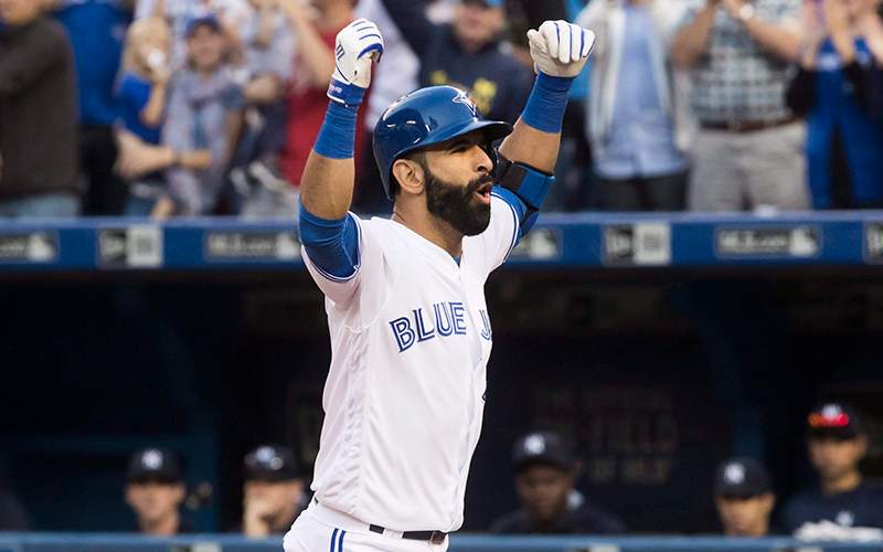 Toronto Blue Jays' Jose Bautista celebrates his three run home run against the New York Yankees during the eighth inning of MLB baseball action in Toronto, Saturday September 24, 2016. 