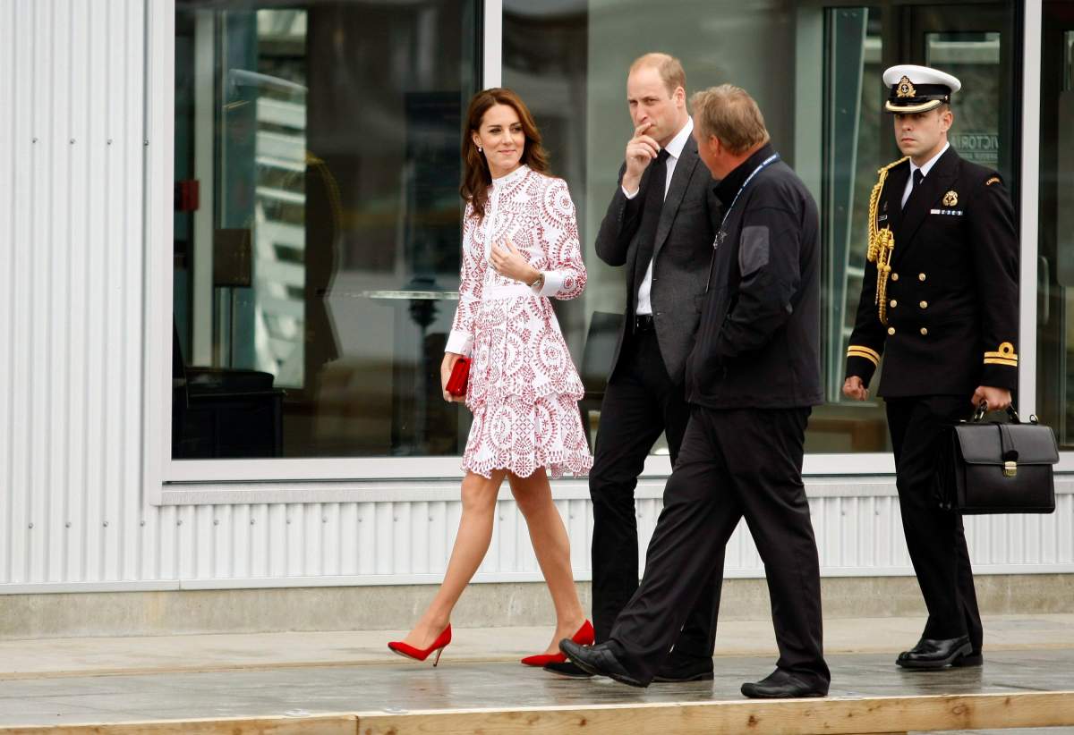 The Duke and Duchess of Cambridge are escorted down to Harbour Air Terminal in Victoria, B.C., Sunday, Sept 25, 2016 where they departed on a float plane on their way to Vancouver for planned events. THE CANADIAN PRESS/Chad Hipolito