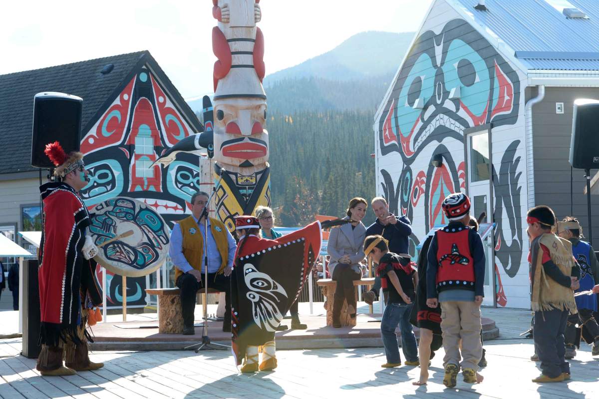 Prince William and his wife Kate, the Duke and Duchess of Cambridge, watch native youth dancers perform during a welcoming ceremony in Carcross, Yukon, Wednesday, Sept. 28, 2016. THE CANADIAN PRESS/Jonathan Hayward