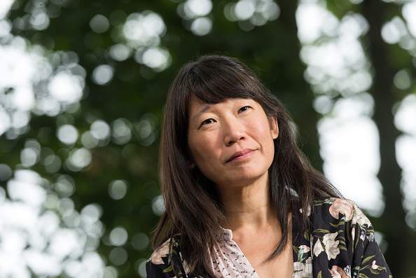 Canadian short story writer and novelist Madeleine Thien attends a photocall at Edinburgh International Book Festival at Charlotte Square Gardens on August 25, 2016 in Edinburgh, Scotland.  (Photo by Roberto Ricciuti/Getty Images).