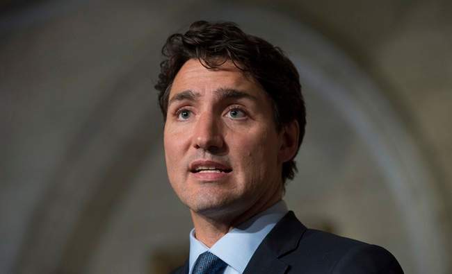 Canadian Prime Minister Justin Trudeau responds to a question on Parliament Hill in Ottawa, Tuesday September 13, 2016.