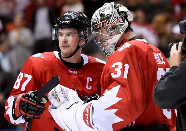 Canada's Sidney Crosby (87) and goalie Carey Price (31) look on before the end of third period World Cup of Hockey action against the Czech Republic, in Toronto on Saturday, September 17, 2016. Canada swept the Czechs 6-0.
