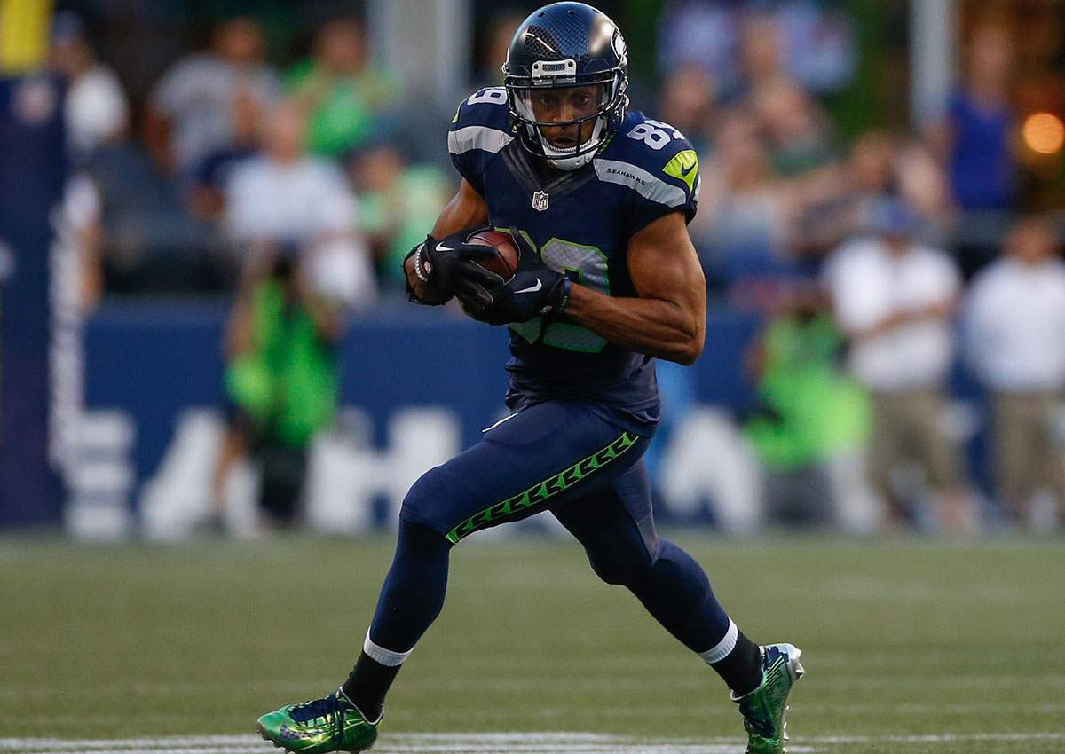 Wide receiver Doug Baldwin of the Seattle Seahawks rushes against the Dallas Cowboys during the preseason game at CenturyLink Field on August 25, 2016 in Seattle, Washington.