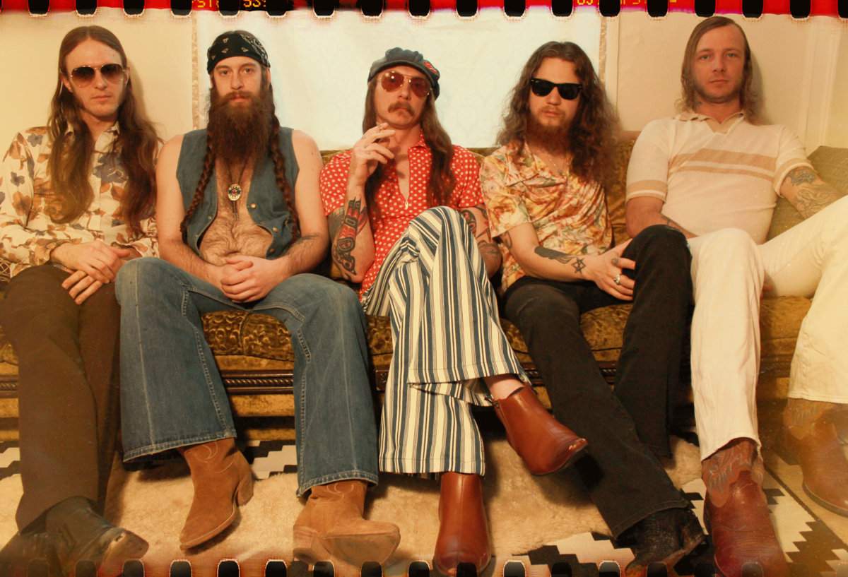The members of Black Pussy pose for a publicity shot.