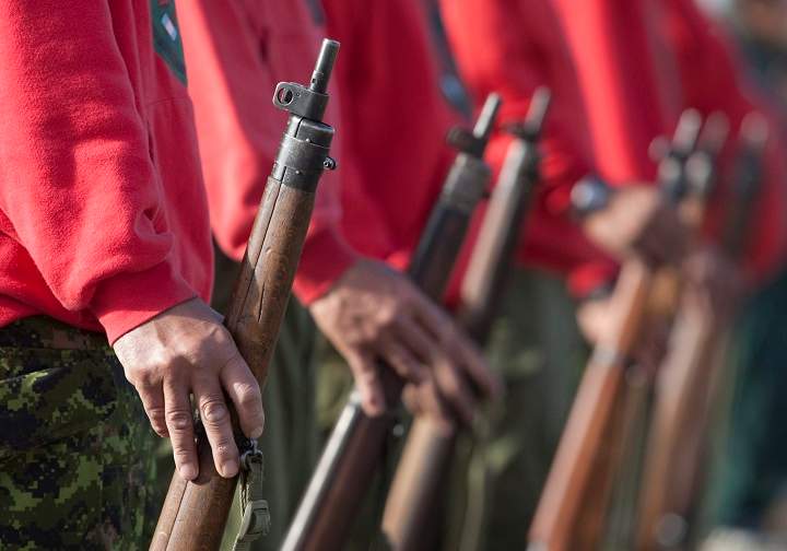 Members of the Canadian Rangers parade in Pangnirtung, Nunavut 20 Aug., 2009. The Rangers are getting new firearms.  