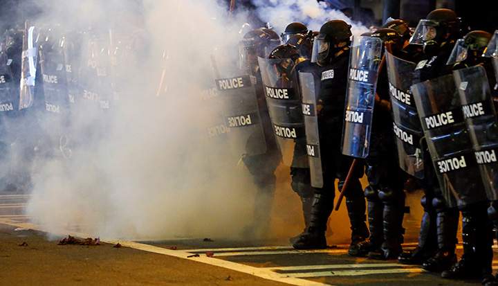 Police hold their lines in uptown Charlotte, NC during a protest of the police shooting of Keith Scott, September 21, 2016.