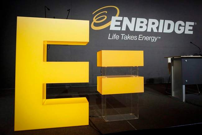 Enbridge company logos on display at the company's annual meeting in Calgary, .