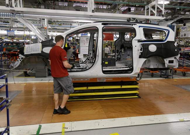 Steve Vince works on a 2017 Chrysler Pacifica on the assembly line at the Windsor Assembly Plant, Friday, May 6, 2016, in Windsor, Ontario. 