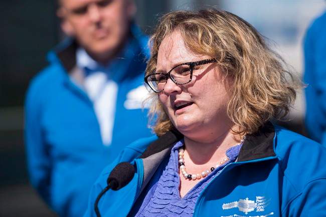 Alberta Deputy Premier Sarah Hoffman speaks with media. THE CANADIAN PRESS/Jimmy Jeong.