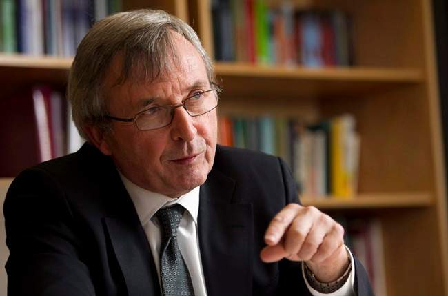 Canada's former Chief Statistician Wayne Smith is shown in this file image at his office at Stats Canada in Ottawa Friday Feb. 11, 2011.