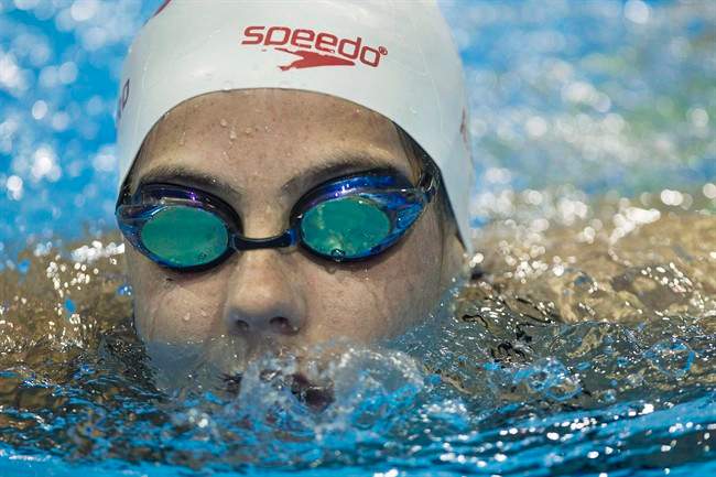 FILE - Canadian swimmer Aurelie Rivard and wheelchair racer Brent Lakatos broke Paralympic records in their respective morning heats on Friday at the Paralympic Games. Rivard swims during a media availability as the Canadian Paralympic Swim Team for Rio 2016 is announced in Toronto in an August 29, 2016, file photo. 