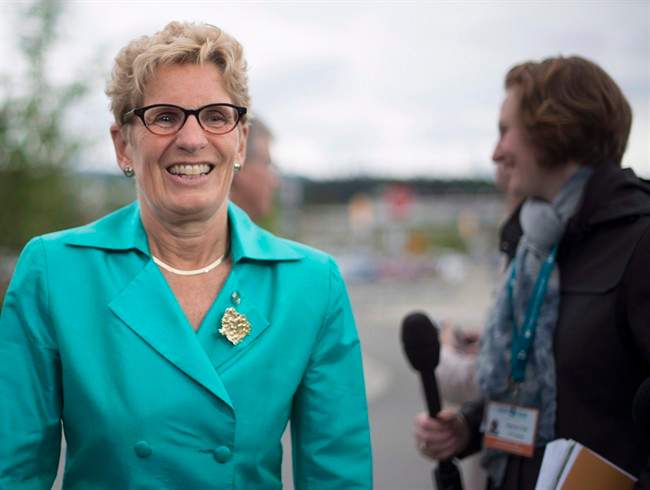 Premier Kathleen Wynne arrives for a meeting of Premiers in Whitehorse, Yukon, Friday, July, 22, 2016.