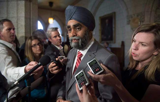 Minister of National Defence Minister Harjit Sajjan speaks with the media before Question Period on Parliament Hill in a June 15, 2016, file photo.