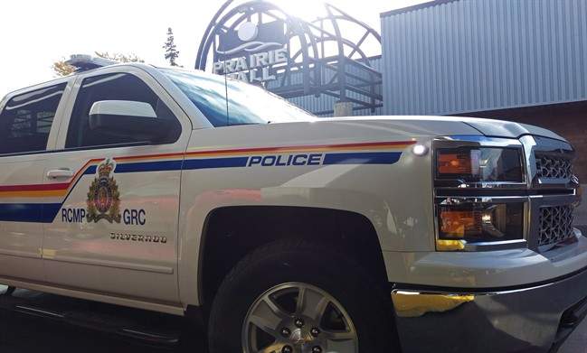 An RCMP truck is parked outside of the Prairie Mall in Grande Prairie, Alta. on Thursday, Sept. 15, 2016. 