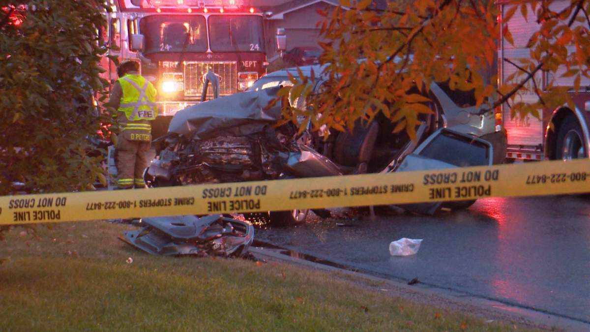 Emergency crews respond to a head-on collision between two SUVs on 24 Street S.W. near Anderson Road S.W. on Thursday, Sept. 23, 2016.