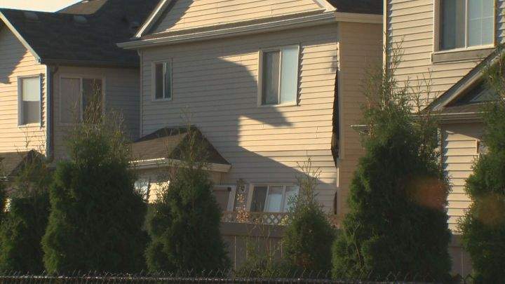 A significant police presence as well and multiple fire crews could be seen outside a southwest Edmonton home Tuesday evening as it appeared the wall of a house suffered significant damage. Sept. 13, 2016.
