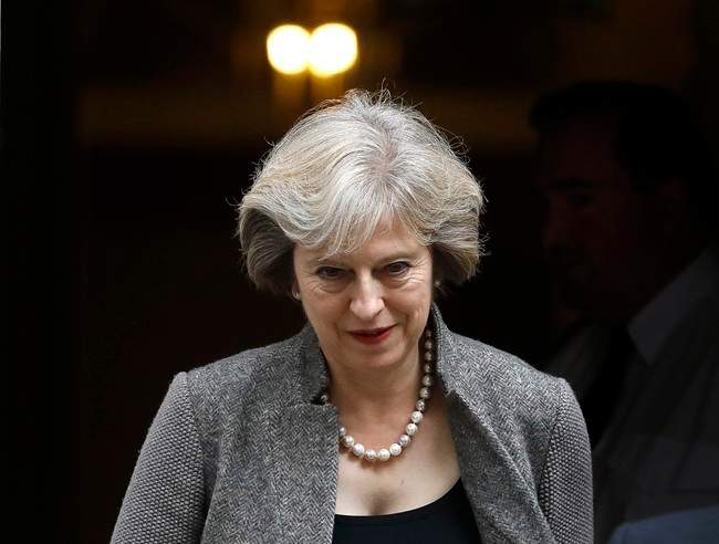 Britain's Prime Minister Theresa May leaves 10 Downing Street in London, Monday, Sept. 26, 2016. (AP Photo/Frank Augstein).