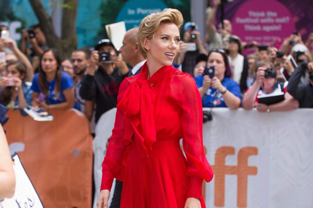 Scarlett Johansson poses for photographs at the premiere of Sing at the Toronto International Film Festival in Toronto, Ontario, September 11, 2016.