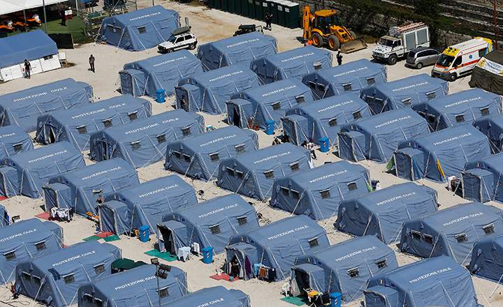 A tent camp is seen from above after an earthquake levelled the town of Amatrice, central Italy, September 1, 2016.