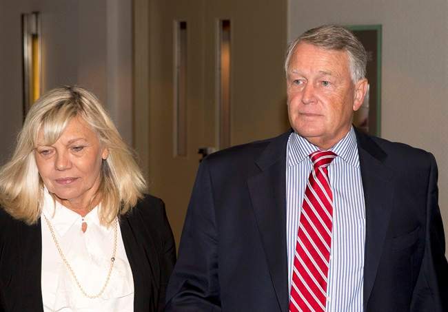 Federal Court Justice Robin Camp, right, and wife Maryann Camp arrive at a Canadian Judical Council inquiry in Calgary, Alberta on Monday, Sept. 12, 2016.